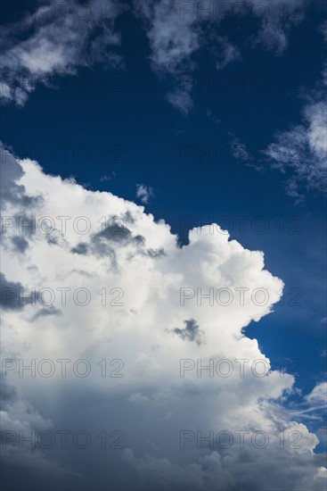 Puffy clouds on sky.