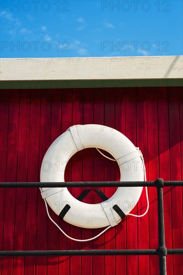 Close up of life belt on tugboat.