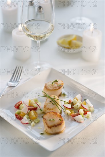 Seafood on plate in restaurant.