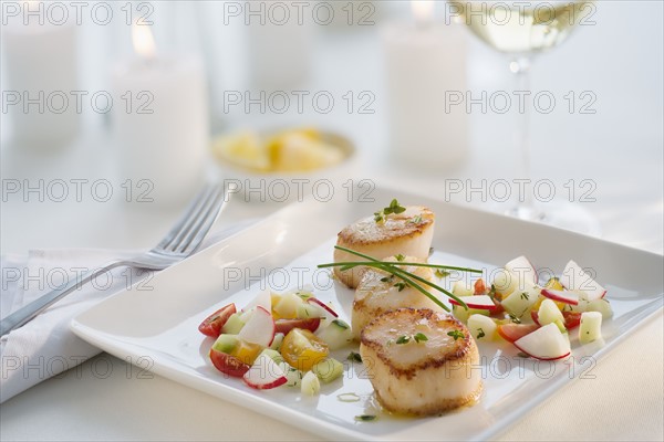 Seafood on plate in restaurant.