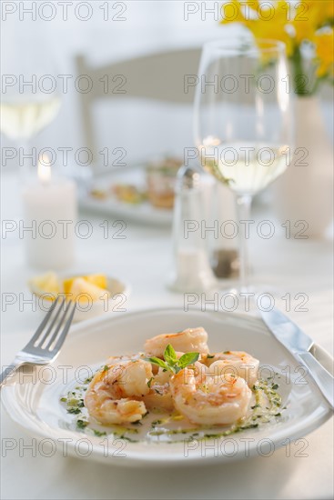 Seafood on plate in restaurant.
