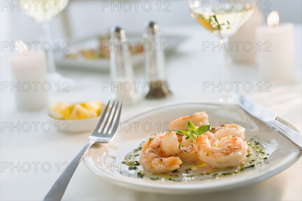 Seafood on plate in restaurant.