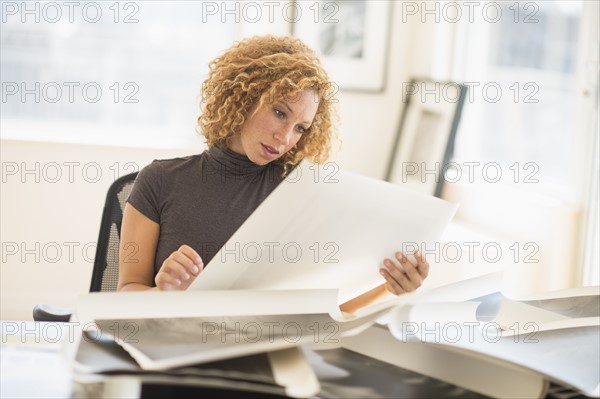 Woman working in art gallery.