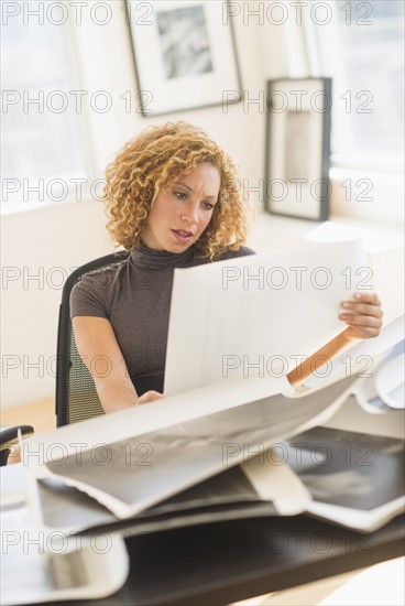 Woman working in art gallery.