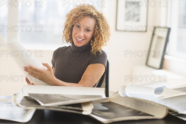 Woman working in art gallery.