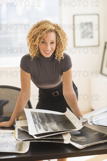 Woman working in art gallery.