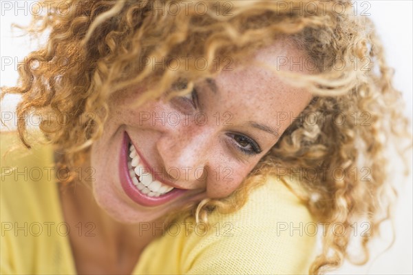 Portrait of smiling young woman.