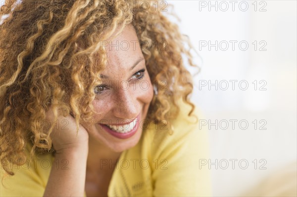 Portrait of smiling young woman.