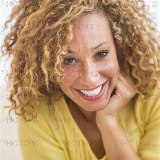 Portrait of smiling young woman.