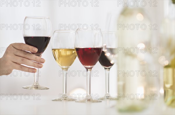 Glasses with red, rose and white wine.