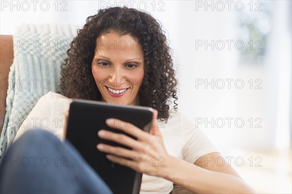 Woman with digital tablet.