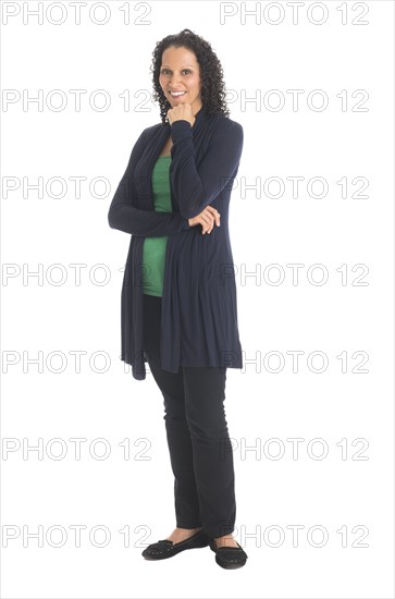 Studio shot of woman standing.