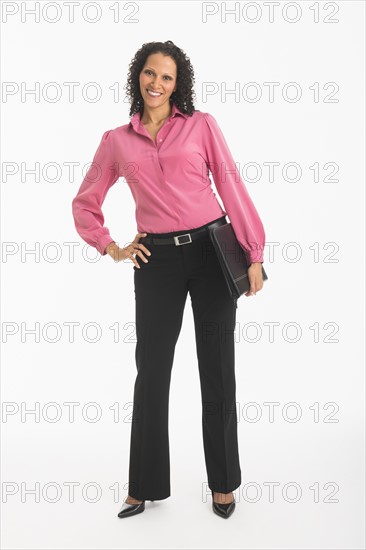 Studio shot of woman standing.