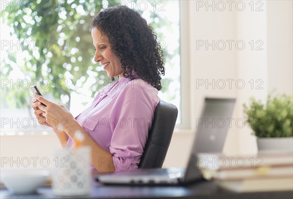 Woman working in office.