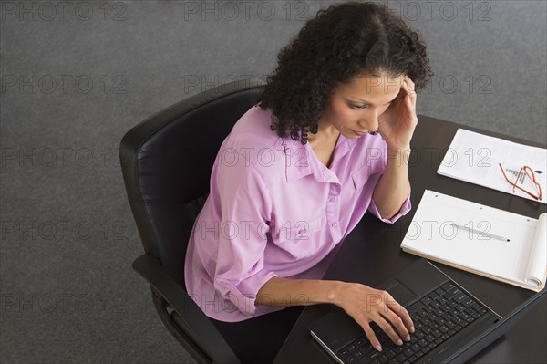 Woman working in office.