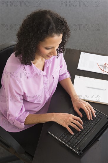 Woman working in office.