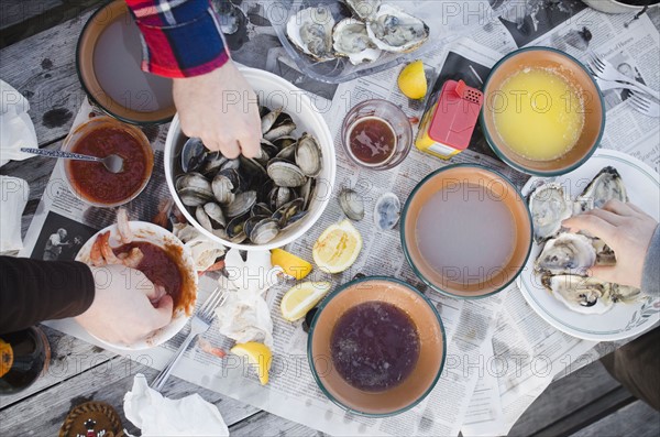 People eating oysters. Photo: Jamie Grill