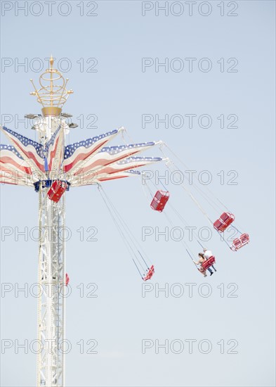 Carousel in amusement park. Photo : Jamie Grill