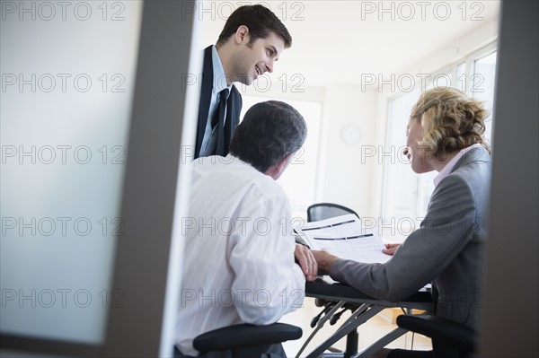 Office workers on meeting. Photo: Jamie Grill