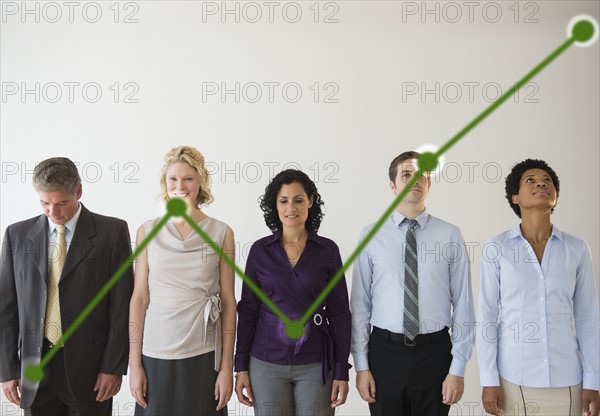 Office workers and green graph. Photo: Jamie Grill