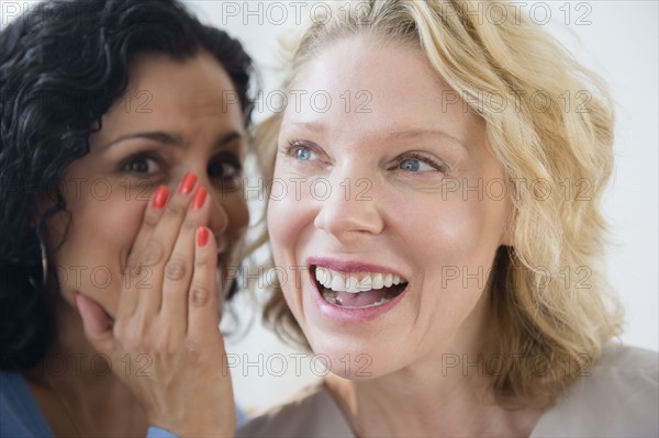 Female friends gossiping. Photo: Jamie Grill