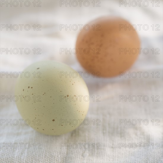 Two eggs on tablecloth. Photo: Daniel Grill