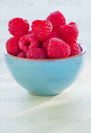 Bowl filled with fresh raspberries. Photo: Daniel Grill