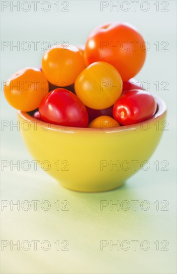 Studio Shot of tomatoes in bowl. Photo: Daniel Grill