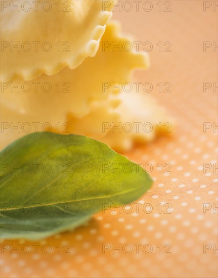 Studio Shot of ravioli and basil leaf. Photo: Daniel Grill