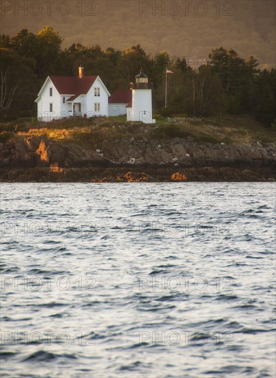 View of sea shore with small lighthouse. Photo: Daniel Grill
