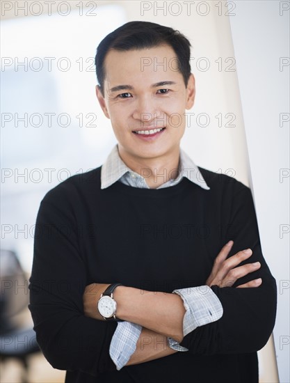 Portrait of confident mid adult man. Photo : Daniel Grill