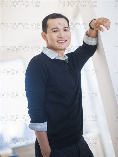 Portrait of confident mid adult man. Photo: Daniel Grill