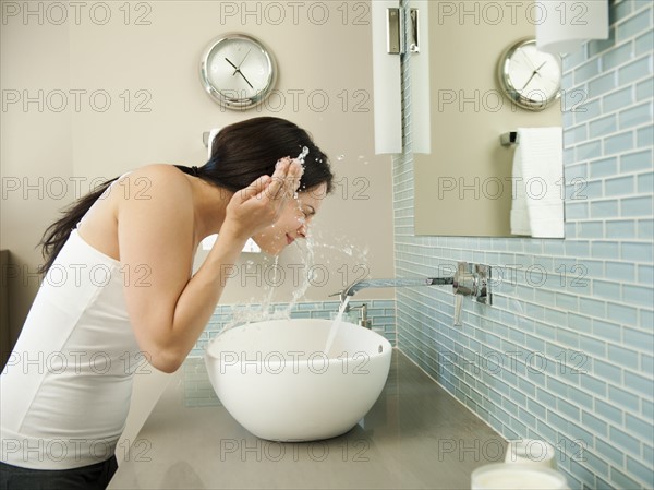 Young attractive woman in her morning toilette.