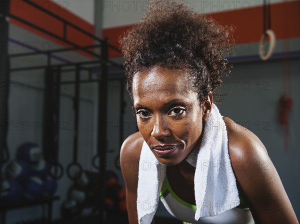 Portrait of mid-adult woman in gym. Photo: Erik Isakson