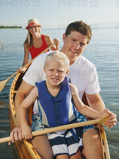 Portrait of family with son (4-5) canoe traveling. Photo: Erik Isakson