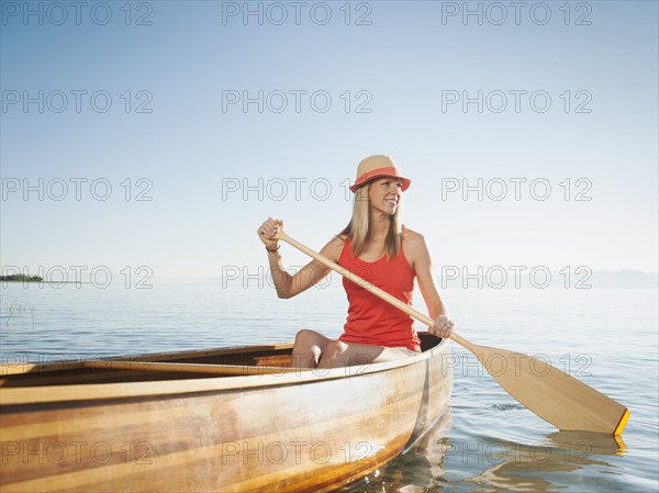 Portrait of young woman canoe traveling. Photo: Erik Isakson