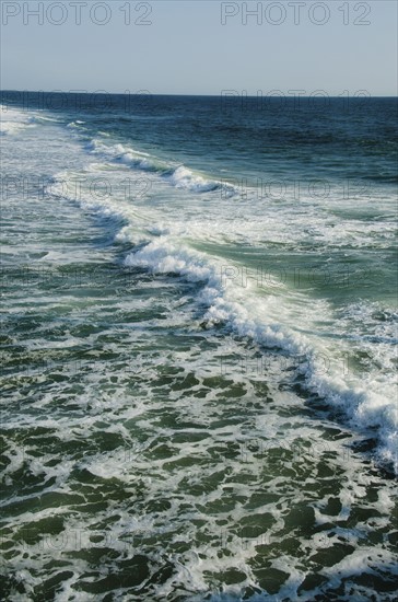 Outer Banks, water's edge. Photo: Tetra Images
