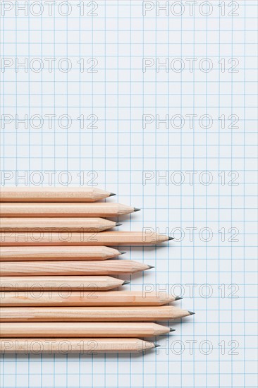 Grouping of wooden pencils in graph shape on graph paper. Photo : Kristin Duvall