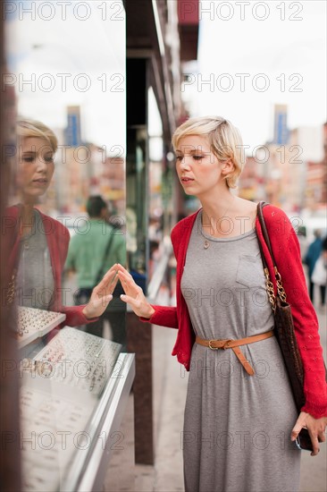 Woman looking at shop display. Photo: Jessica Peterson