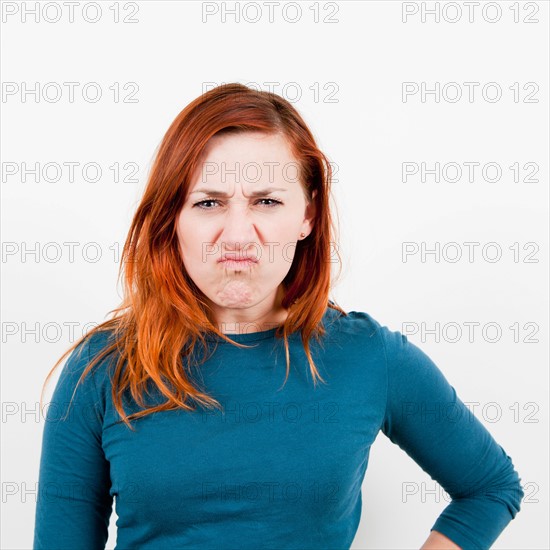 Studio shot, Portrait of angry woman. Photo: Jessica Peterson