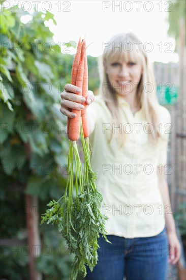 Woman working in garden. Photo: Jessica Peterson