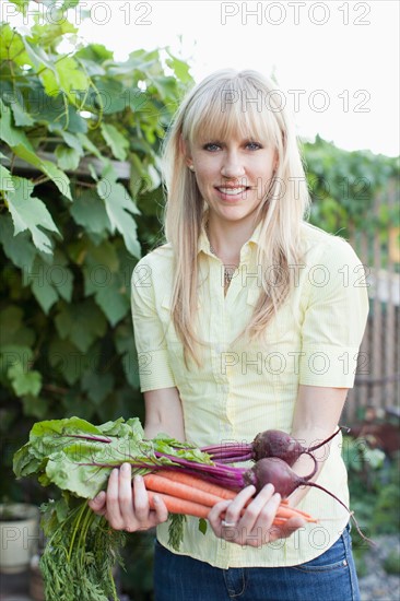 Woman working in garden. Photo: Jessica Peterson