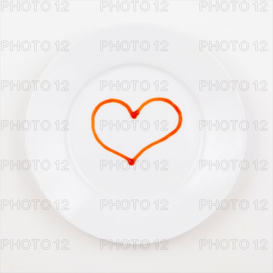 Studio shot of plate with heart made of ketchup. Photo: Jessica Peterson