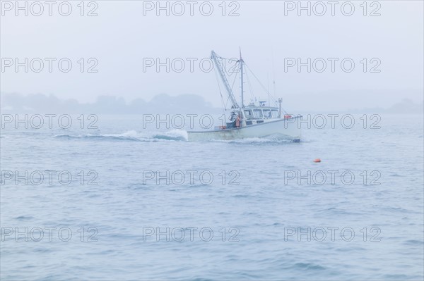 Lobster boat on sea. Portland, Maine.