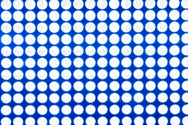 Spotted blue and white background.