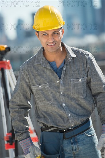 Portrait of engineer in construction site.