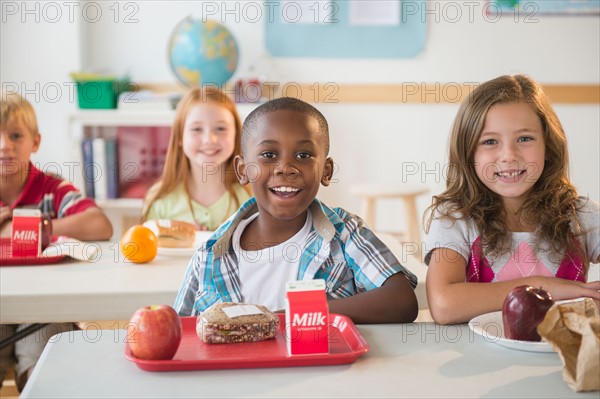 Portrait of schoolgirl (8-9) in classroom