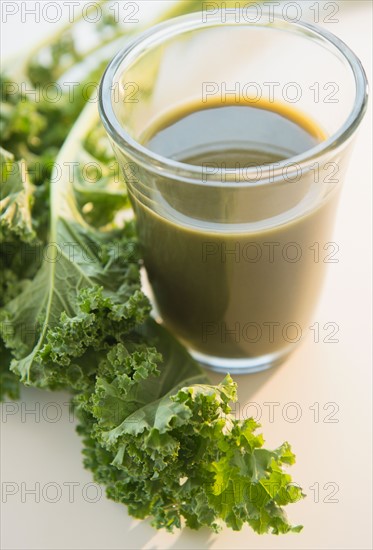 Studio shot of kale and green smoothie