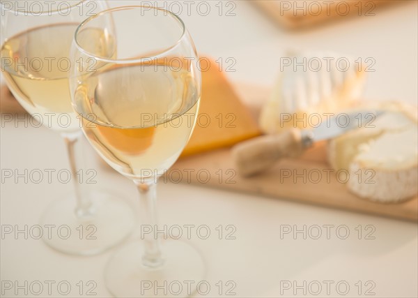 Studio shot of cheese on chopping board