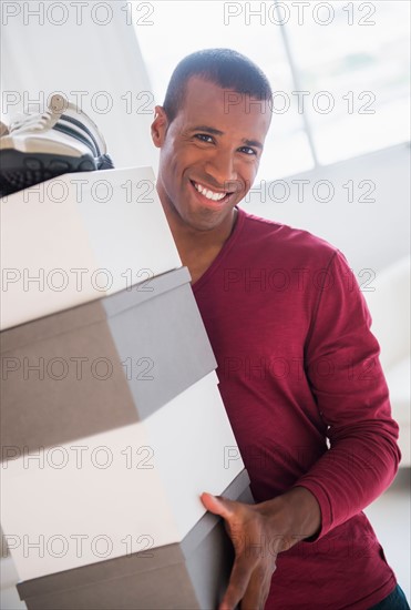 Young man in shoes store